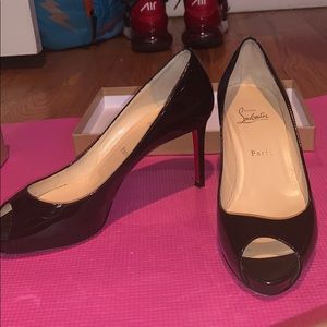 Black leather red bottom Louis Vuitton Stilettos!!